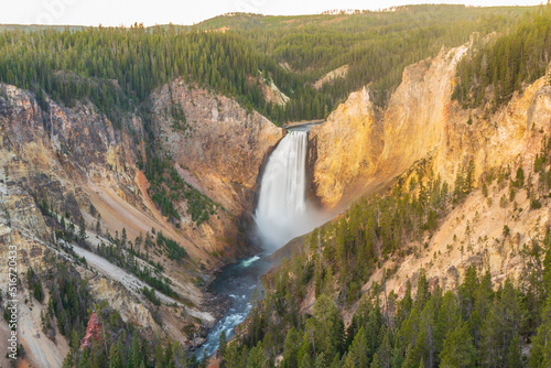 Sunrise at Lower Falls waterfall in Yellowstone National Park