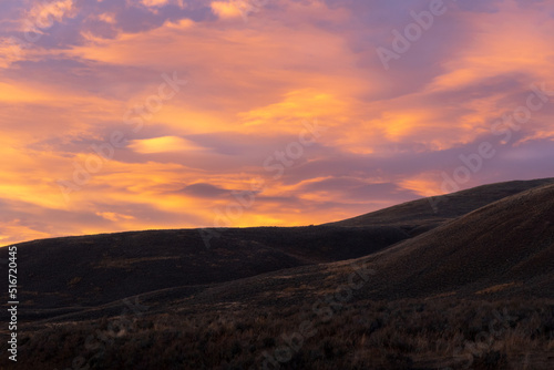 Orange cloud sunset in Lamar Valley in Yellowstone National Park