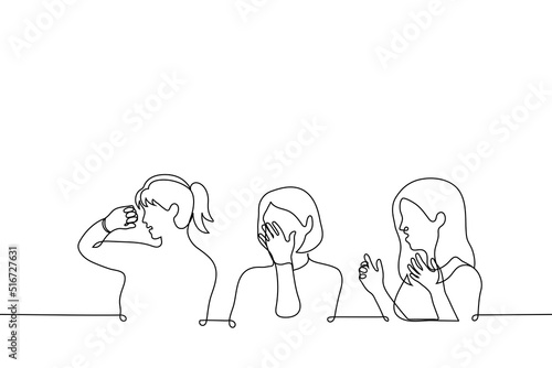 women are disgusted - one line drawing vector. concept sitting girls are unpleasantly shocked and try not to look at something