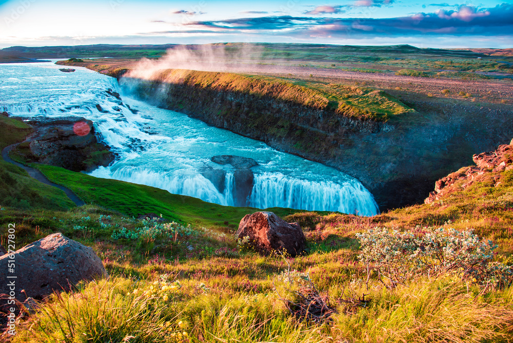 Magical charming bright colorful landscape with a famous Gullfoss waterfall in the sunrise in Iceland. Exotic countries. Amazing places. Popular tourist atraction. (Meditation, antistress - concept).
