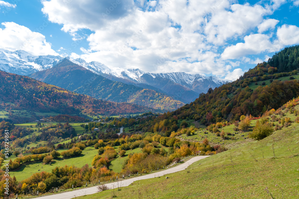 Beautiful autumn landscape of the Caucasus mountains, serpentine on a sunny day, Svaneti, Georgia