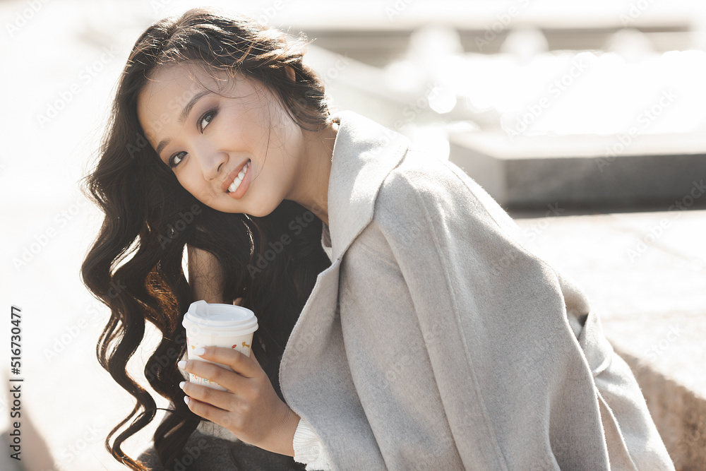 Attractive young lady drinking coffee. Beautiful young woman closeup portrait. Female facial portrait. Attractive young lady drinking coffee. Beautiful young woman closeup portrait. Female facial portrait.
