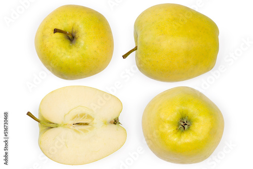 Whole and half of green-yellow apple from different sides