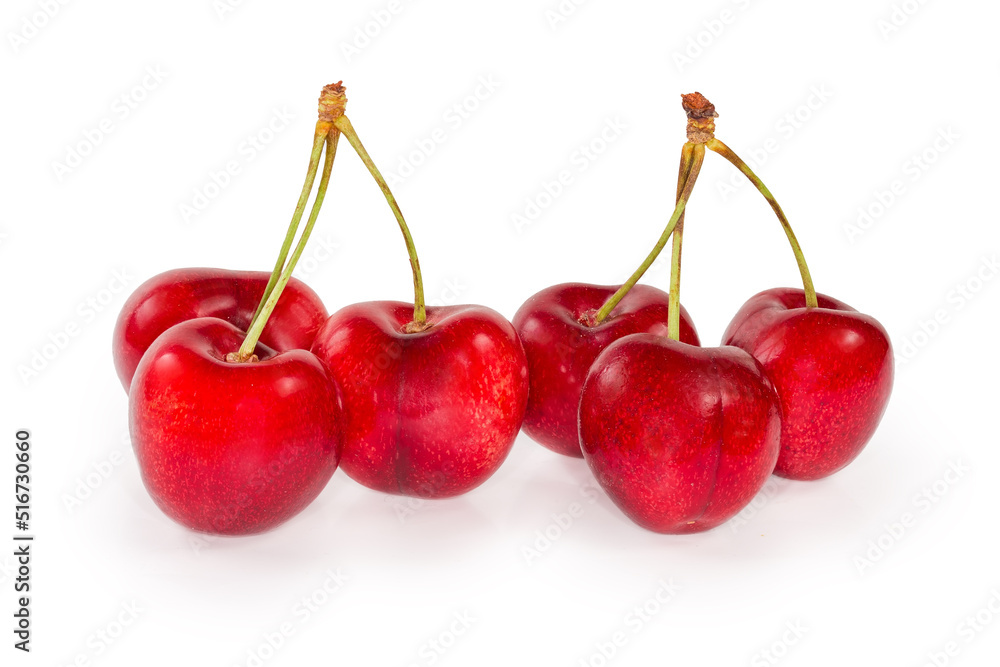 Red sweet cherries on twigs on white background close-up Red sweet cherries on twigs on white background close-up