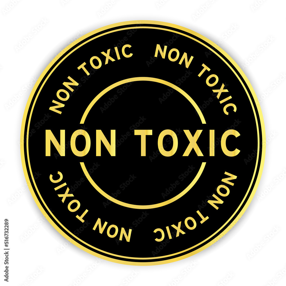 Black and gold color round label sticker with word non toxic on white background Black and gold color round label sticker with word non toxic on white background