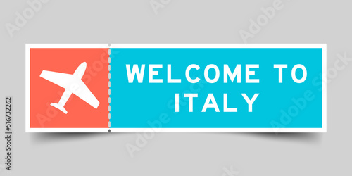 Orange and blue color ticket with plane icon and word welcome to italy on gray background