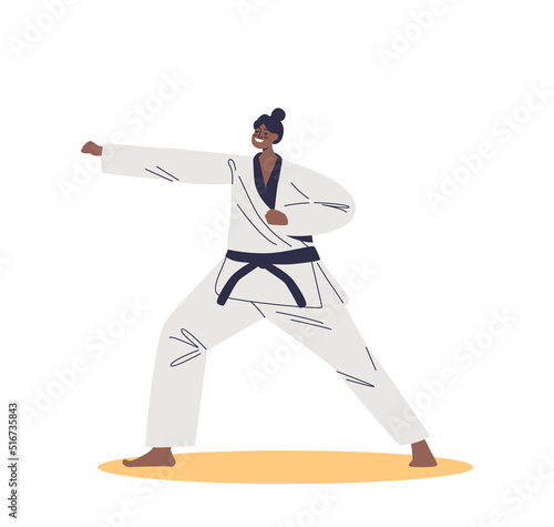 Female judo wrestler in kimono costume for competition. Woman karate fighter ready for fight