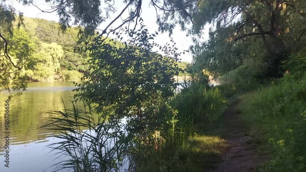 A beautiful trail alongside the lake A beautiful trail alongside the lake