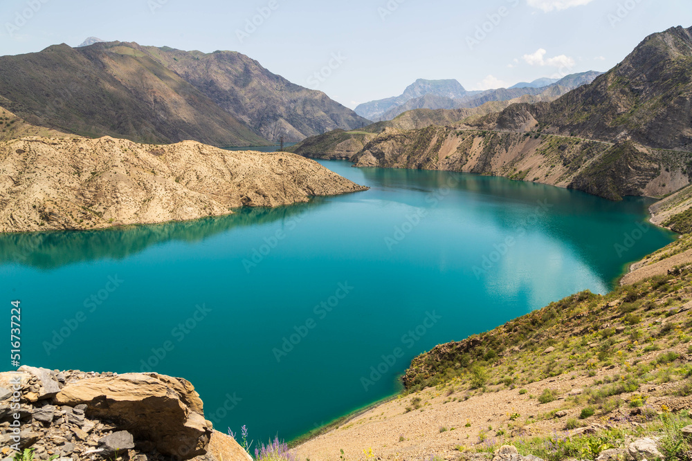 Beautiful mountain landscape on sunny day. Turquoise water of Naryn river in the mountains not far from Jalal-Bad. Kyrgyzstan