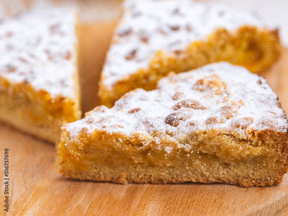 apple and nuts pie on wooden background apple and nuts pie on wooden background