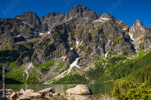 Panoramic view of Morskie oko or Eye of The Sea lake in Polish Tatra mountains at summer