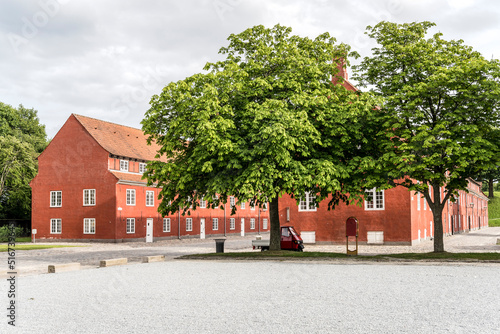 Photography trees, three-wheeler and historical buildings at Kastellet fortification, Copenh