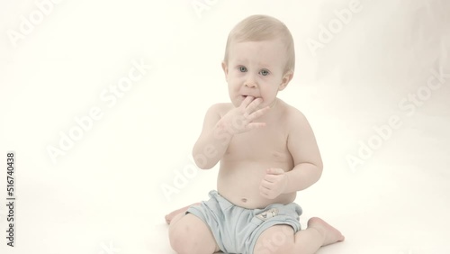 baby child sitting on the floor