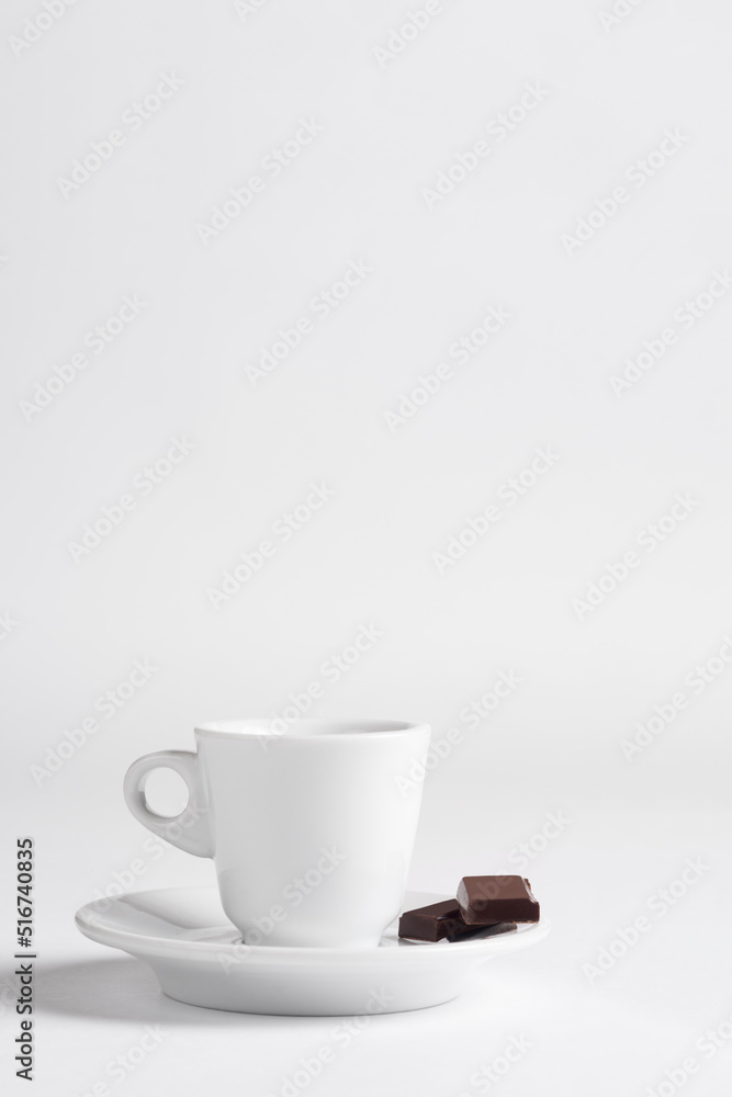 Coffee cup with chocolate on a white background.Cup of espresso. Coffee cup with chocolate on a white background.Cup of espresso.