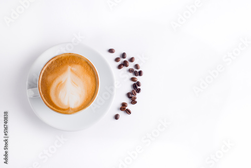 Coffee and grains of coffee on a white background. cappuccino coffee photo