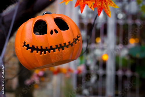 Craved pumpkin head jack lantern is decorated with scary theme in Halloween holiday. photo