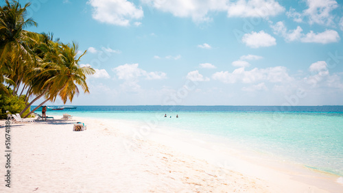 Fototapeta Naklejka Na Ścianę i Meble -  Vacation summer holidays background wallpaper - sunny tropical Caribbean paradise beach with white sand in Seychelles Praslin island Thailand style with palms