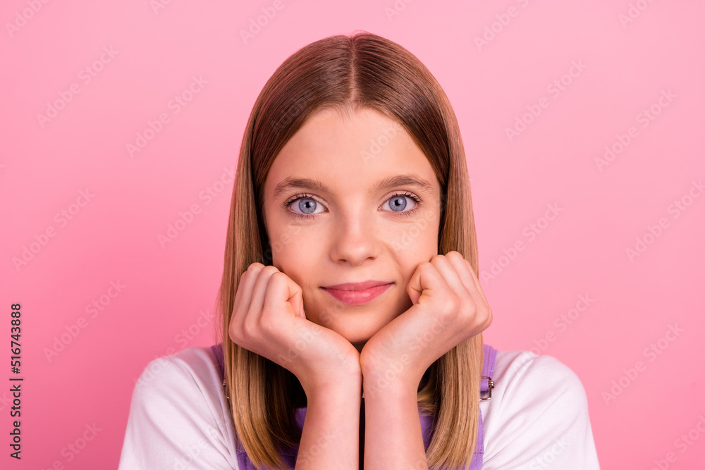Picture of beautiful pretty sweet little woman hold chin on hands enjoy free time isolated on pink color background Picture of beautiful pretty sweet little woman hold chin on hands enjoy free time isolated on pink color background