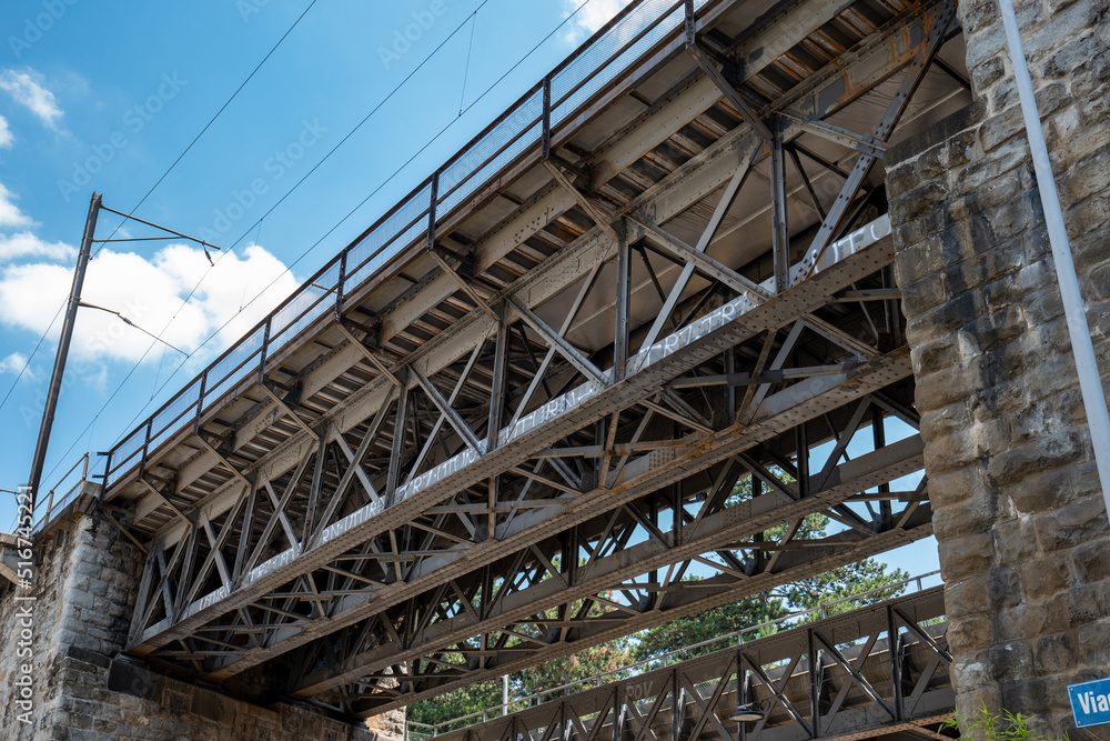 Old concrete and metal scaffolding bridge in Zurich city Europe. Low angle view, no people