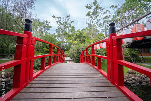 Japanese Red Bridge and pond in forest