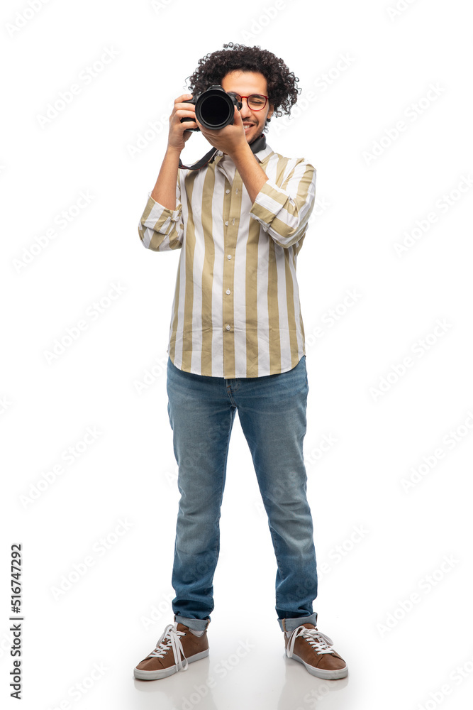 photography, profession and people and concept - happy smiling man or photographer in glasses with digital camera over white background