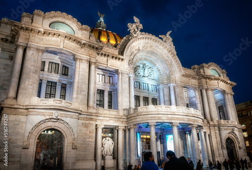 Palacio de Bellas Artes (Palace of Fine Arts)-Dramatic marble performance hall, exhibition venue, museum and theatre in Mexico City, Mexico-A historic building beautifully Illuminated at night. photo