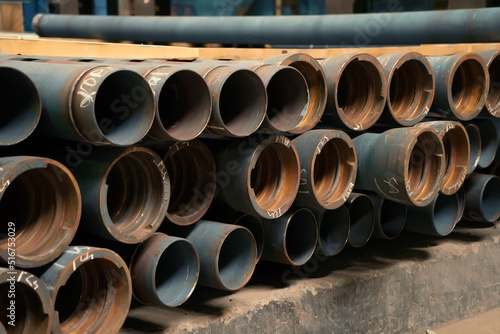 Schilderij op canvas New cast iron pipes with for pipeline close up.