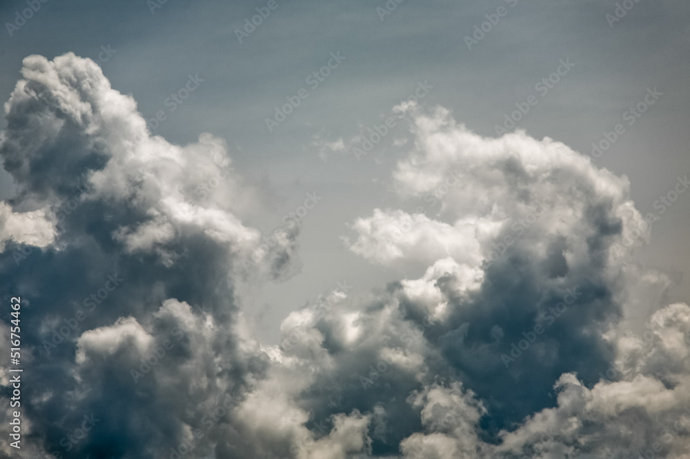 Raine dark clouds in gray sky with sun light Raine dark clouds in gray sky with sun light