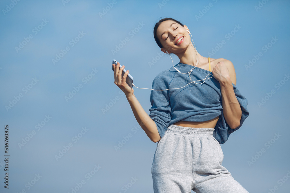 Cute girl have a rest on a sky backgroung Cute girl have a rest on a sky backgroung