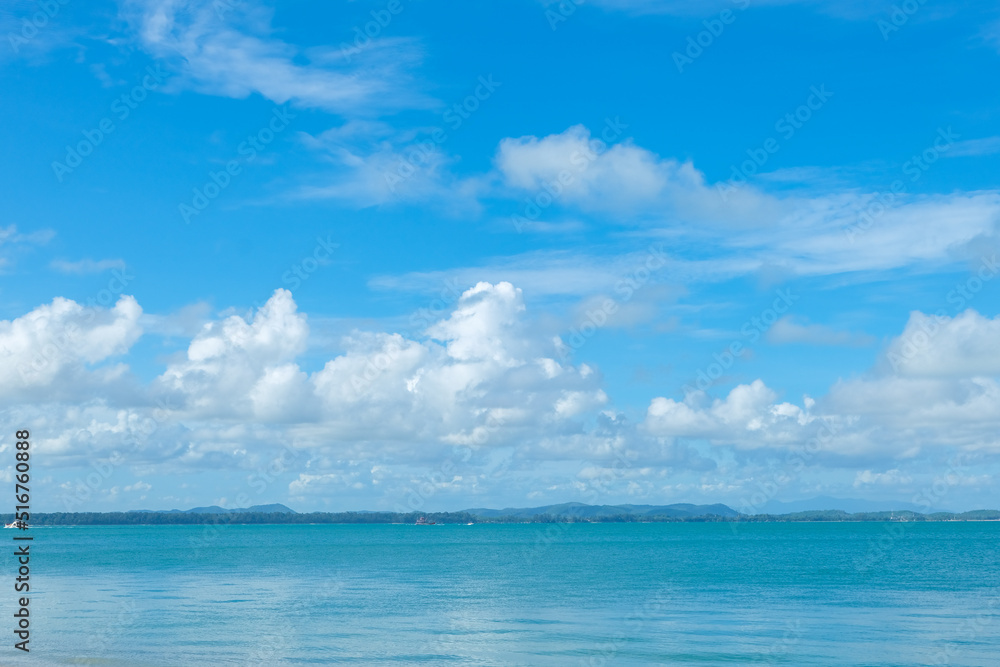 Fototapeta premium Turquoise sea background with blue sky fluffy cloud nature landscape