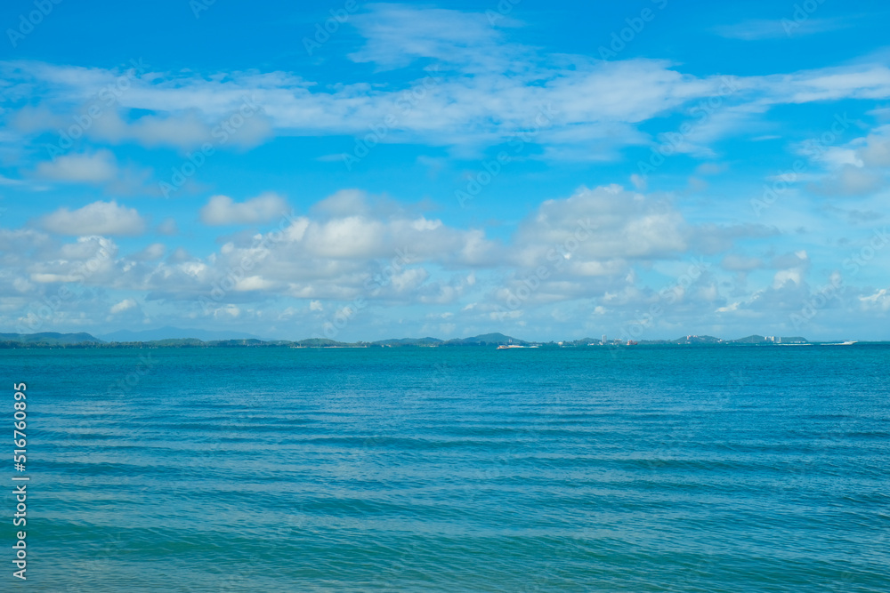 Fototapeta premium Turquoise sea background with blue sky fluffy cloud nature landscape