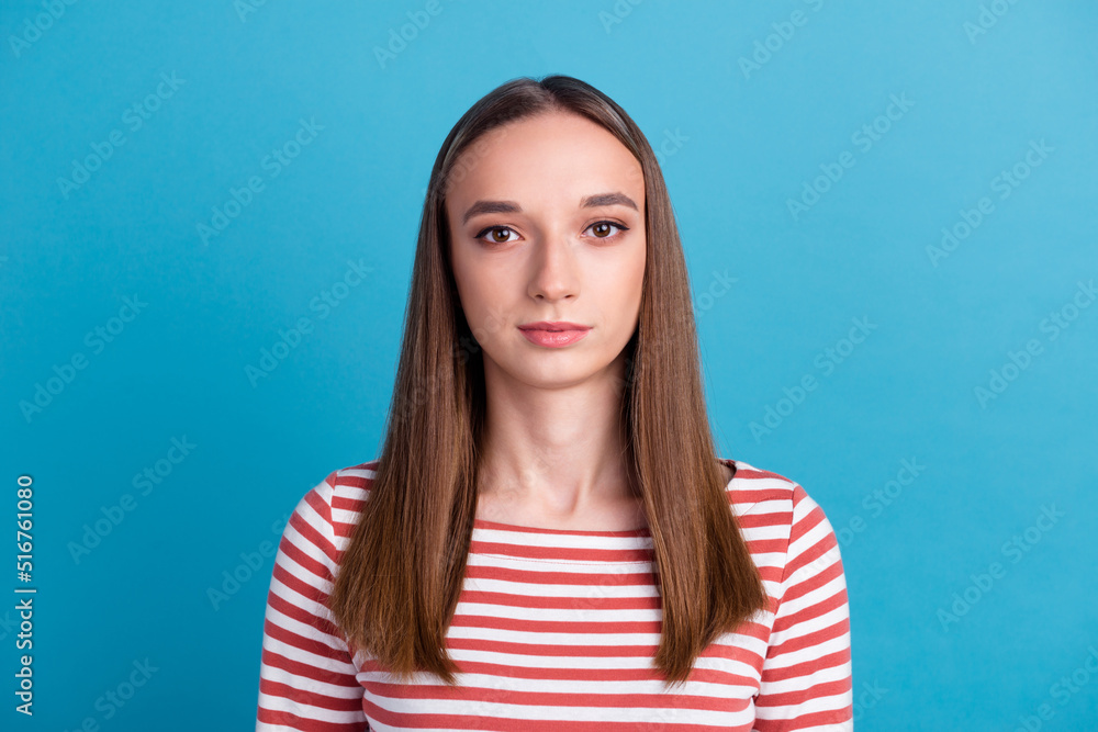 Fototapeta premium Portrait of yong woman casual portrait beautiful model posing in studio over blue background