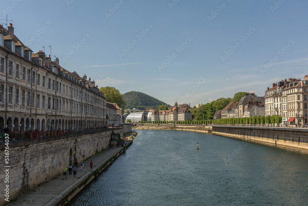 View of the front of houses on the banks of the River Doubs, Besancon, France