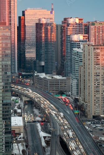 The city traffic on gardiner expressway in Toronto Canada at sunset