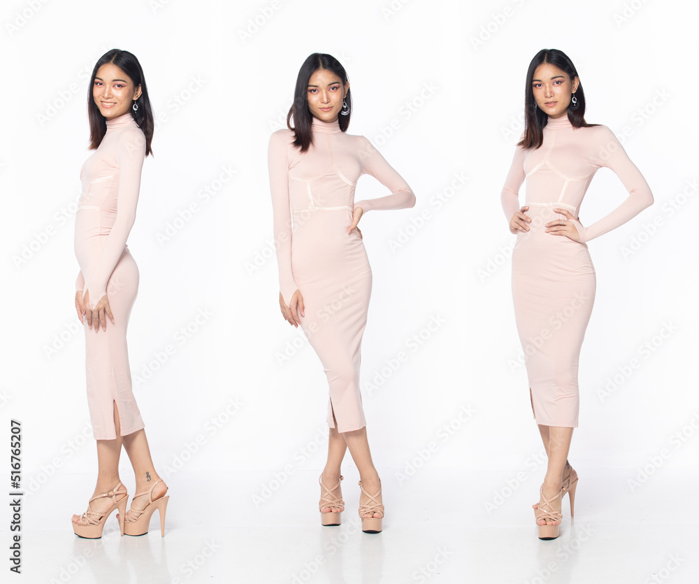 Full length body of Asian beautiful woman wear pastel pink evening sequin gown Full length body of Asian beautiful woman wear pastel pink evening sequin gown