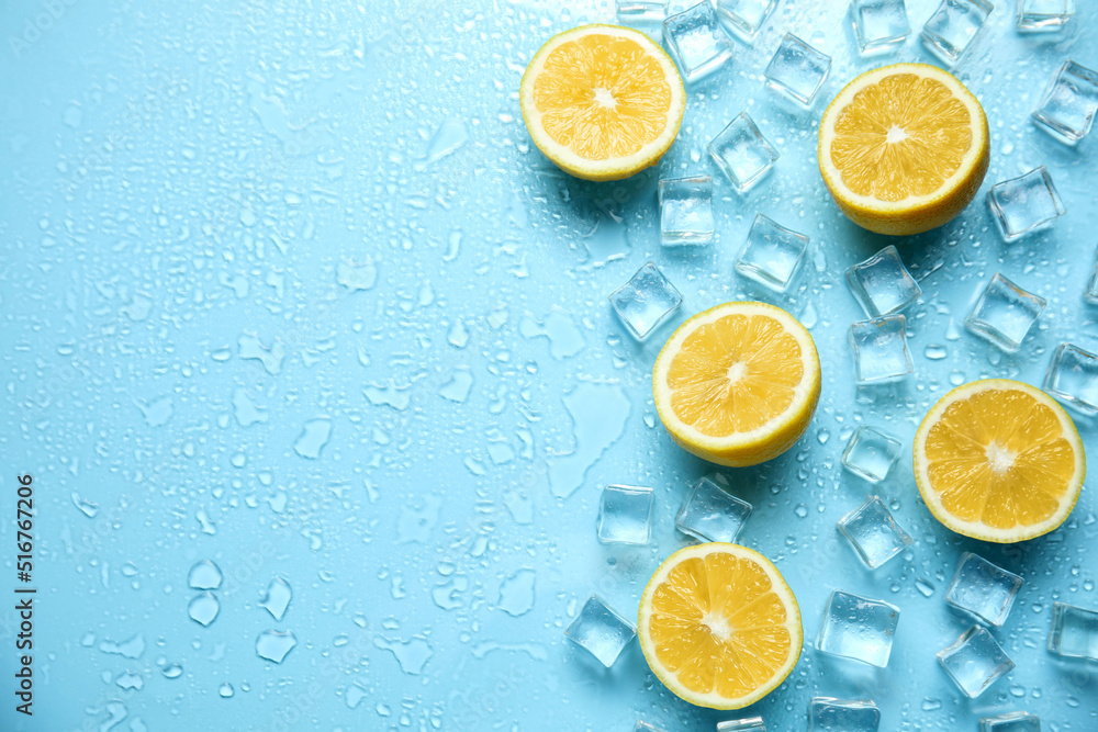 Ice cubes, cut lemons and space for text on turquoise background, flat lay. Refreshing drink ingredients Ice cubes, cut lemons and space for text on turquoise background, flat lay. Refreshing drink ingredients