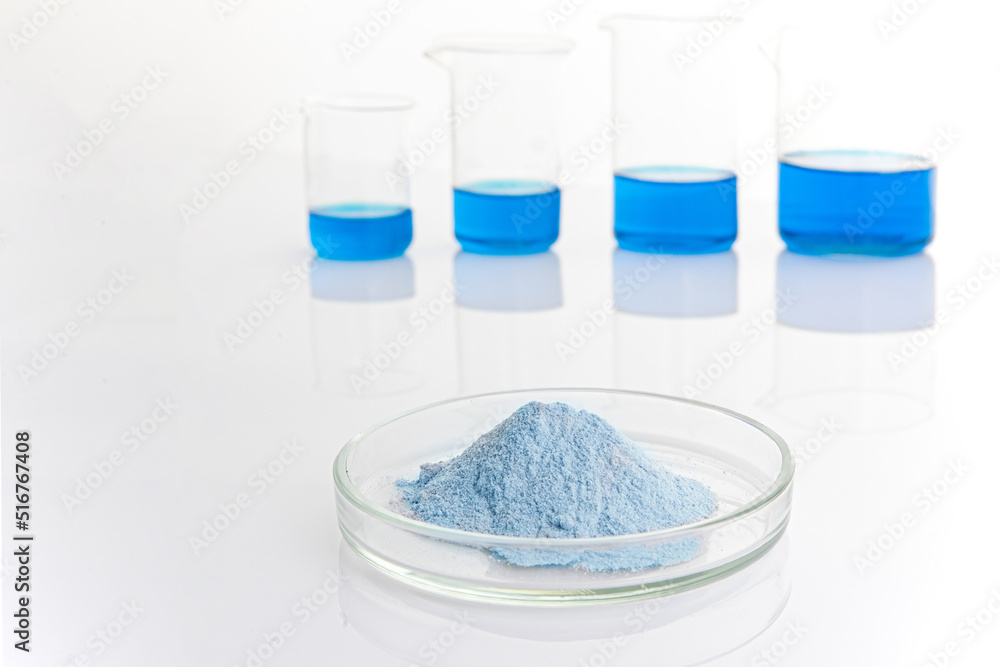 Biological active additive on a white background. Powder dissolved in water Biological active additive on a white background. Powder dissolved in water