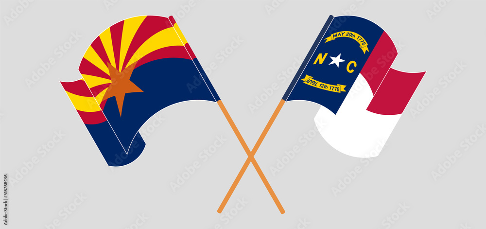 Crossed and waving flags of the State of Arizona and The State of North Carolina