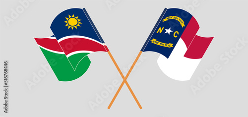 Crossed and waving flags of Namibia and The State of North Carolina