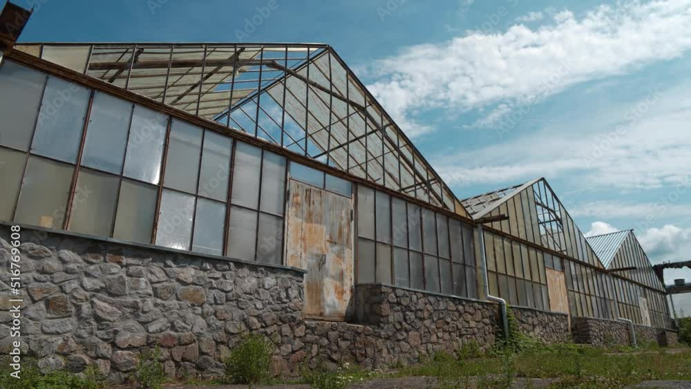 Old abandoned greenhouses with broken glasses Old abandoned greenhouses with broken glasses