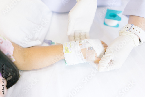 Close up hand with saline intravenous at hospital