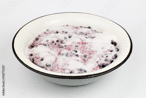 Blueberries dusted with sugar to make homemade jam.