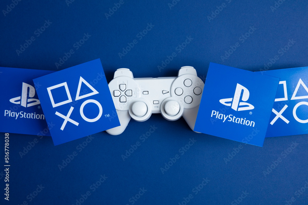 Fotka „LONDON, UK - July 2022: Sony playstation logo against a blue  background. Playstation is a video game brand“ ze služby Stock | Adobe Stock
