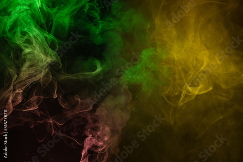 Yellow and pink steam on a black background.