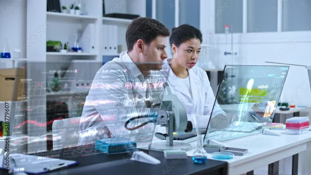 Scientists working in modern medical lab, holographic human skeleton on screen Scientists working in modern medical lab, holographic human skeleton on screen