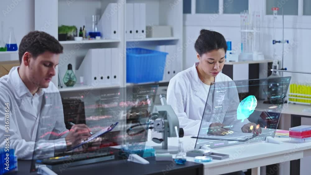 Two medical scientists studying patient brain examination results, neurosurgery Two medical scientists studying patient brain examination results, neurosurgery