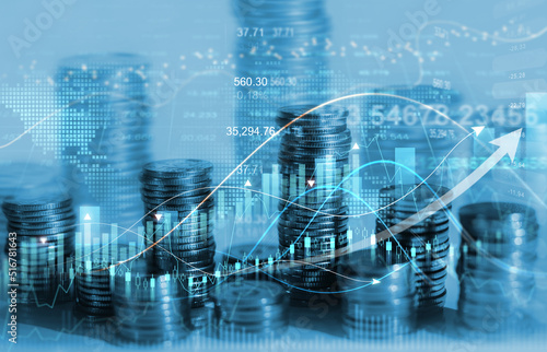 Investment graph and  stock market data.Stacks of rising coins with statistical data. Financial investment and success market, stock technology currency report.  © Miha Creative