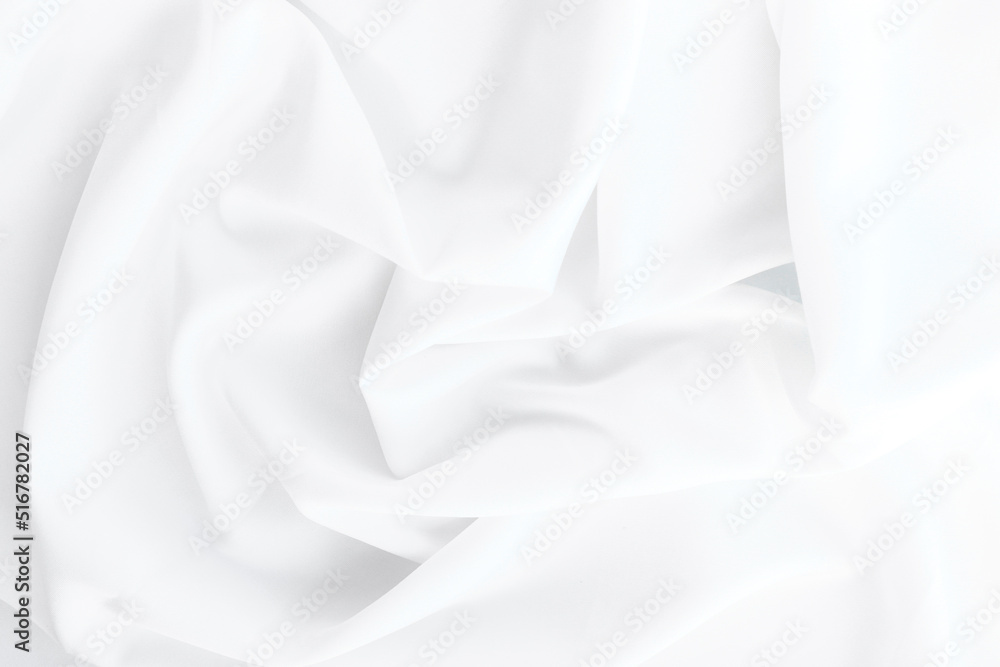 Elegant white silk or elegant satin can be used as a background. Elegant white silk or elegant satin can be used as a background.
