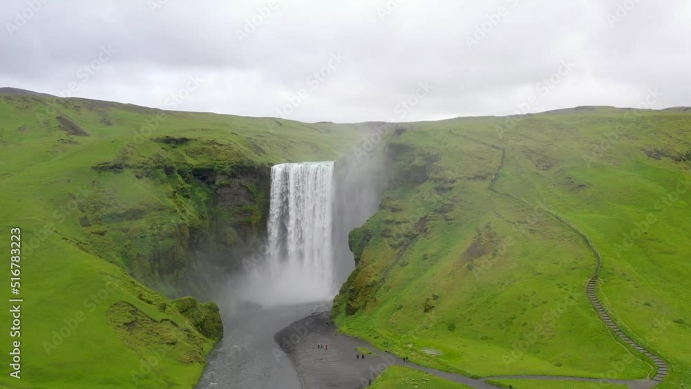 Skogafoss waterfalls in Iceland with drone video moving in. Skogafoss waterfalls in Iceland with drone video moving in.