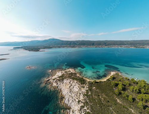 Aerial view of Diaporos Island in Halkidiki, Greece, Small islands with blue lagoon in the Aegean sea during summer holiday season